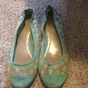 Blue sheer flats with little flower designs
